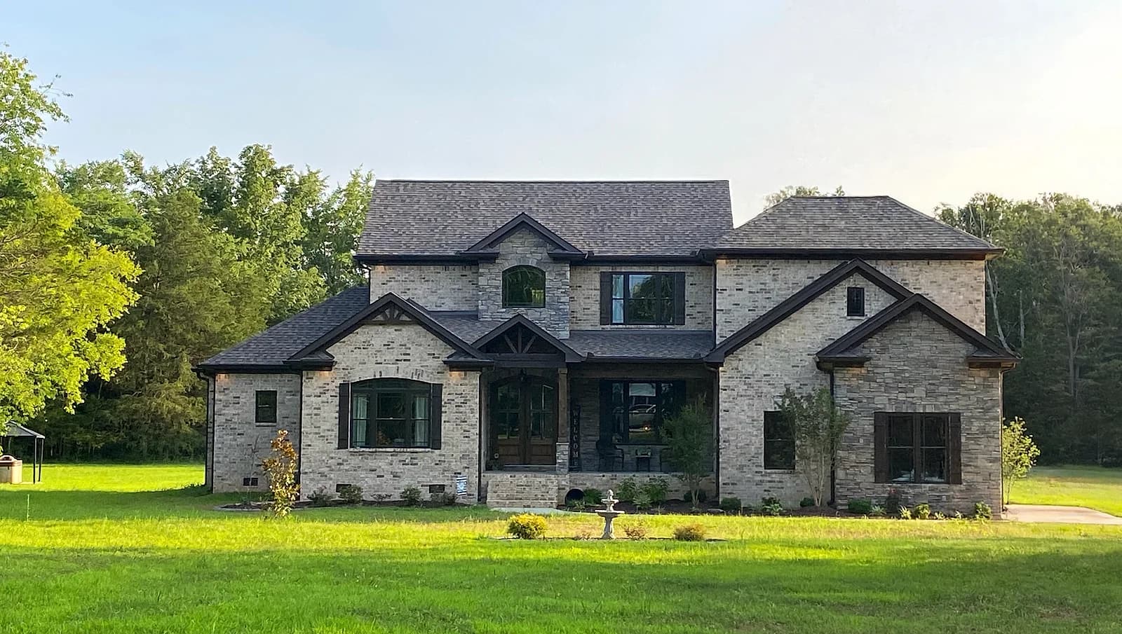 Completed custom home with stone and brick exterior in Murfreesboro, Tennessee