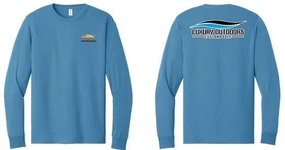 Blue long sleeve shirt laid flat, front and back — small chest logo, and the Luxury Outdoors Custom Pools wordmark under a white swoosh on the back.