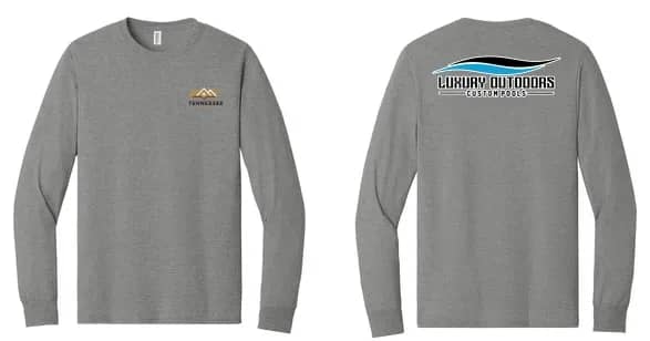 Heather gray long sleeve shirt laid flat, front and back — small chest logo, and a blue-and-black swoosh over the Luxury Outdoors Custom Pools wordmark on the back.